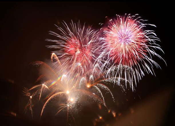 istock New Year abstract fireworks background 1196373960