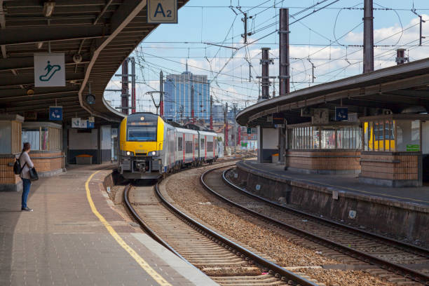 Brussels, Belgium - July 02 2019: Desiro Siemens train opetated by the SNCB arriving at the Brussels-South railway station (French: Gare de Bruxelles-Midi).