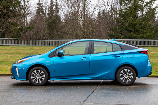 Kent, WA. USA - 12/23/2019: Toyota Prius Hybrid Car All Wheel Drive