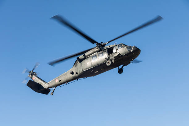 istock Military helicopter in flight 1196377126