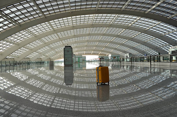 istock Orange Suitcase in Beijing Airport 119637806