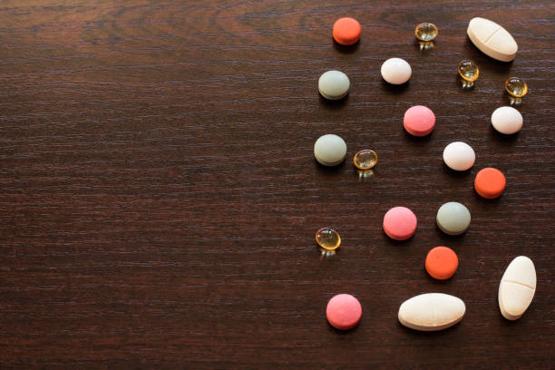 istock pills of medicaments on table 1196381187