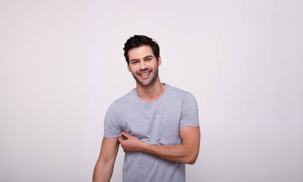 istock Sexy young white guy with a smile on a white background. 1196384542