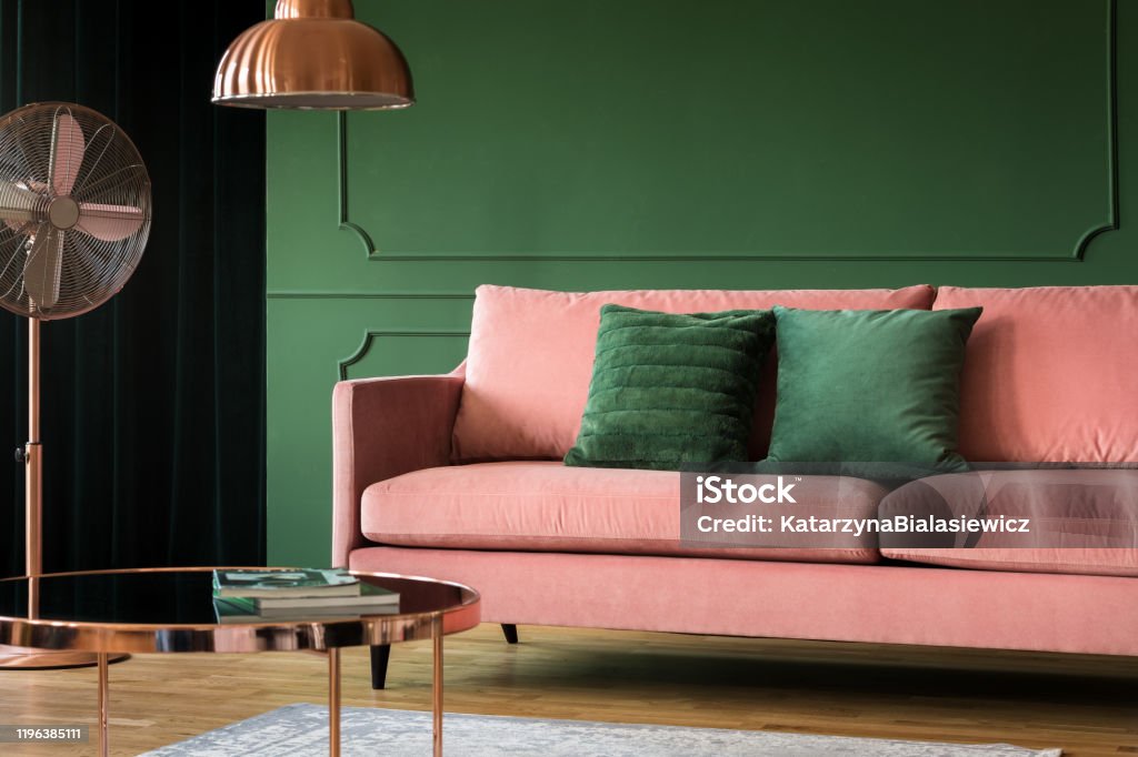 Decorative bottle green wall in glamour living room Velvet Stock Photo