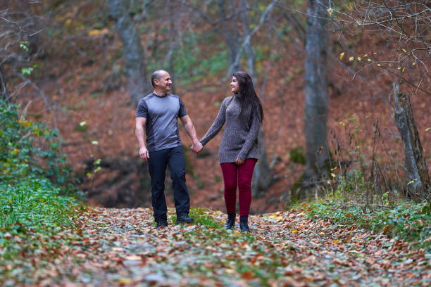 istock Couple walking and having fun 1196387259