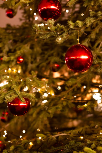 istock Red Christmas ball on a Christmas tree. 1196387417