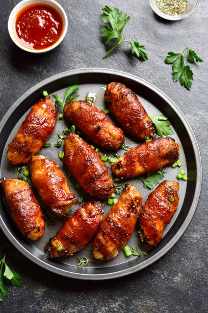 istock Bacon wrapped grilled chicken wings 1196388608