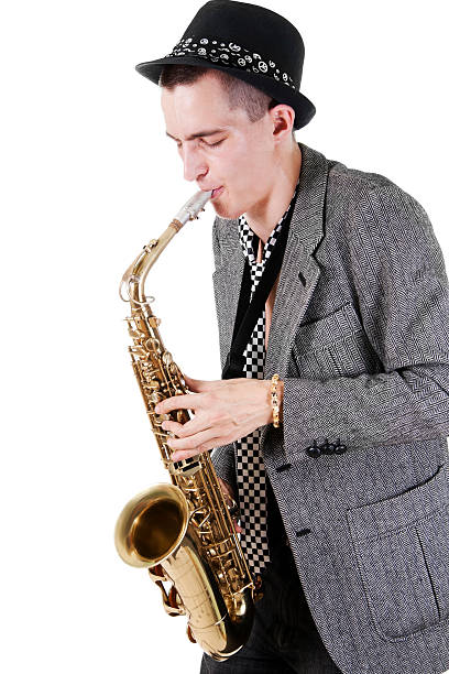 istock The young jazzman plays a saxophone 119639079