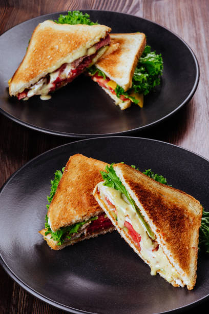 istock Sandwich bread tomato, lettuce and yellow cheese 1196391218