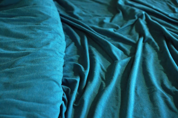 istock A roll of soft textile. Cloth background. 1196391582
