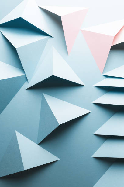 istock Abstract pattern made of colored paper, light blue background 1196392157