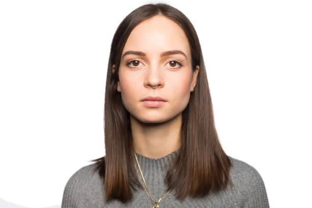 istock Young serious woman portrait in the studio 1196392177