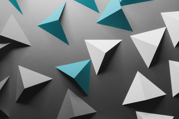 istock Abstract pattern made of colored paper, gray background 1196392203