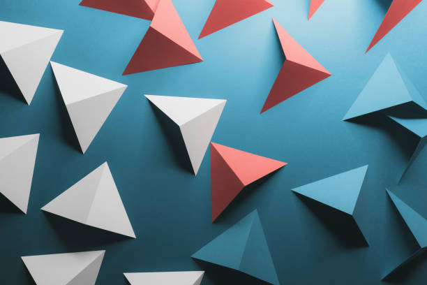 istock Abstract pattern made of colored paper, blue background 1196392301