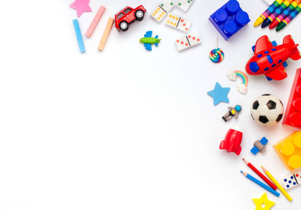 Frame of kids toys on white background Frame of kids toys on white background with blank space for text. Top view, flat lay. block cube pyramid built structure stock pictures, royalty-free photos & images