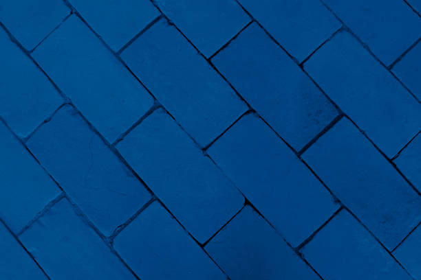 istock Brick background in trendy blue color. 1196394173