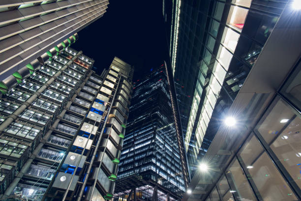 istock Modern Office Buildings at Night 1196396677