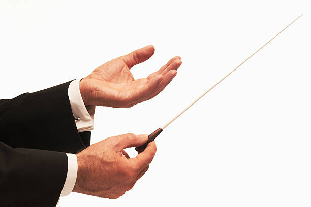istock A conductor conducting an orchestra 119639680