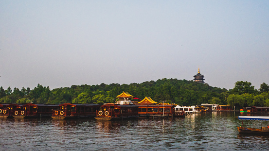 Tourist boats in dock in West Lake, in Hangzhou, China