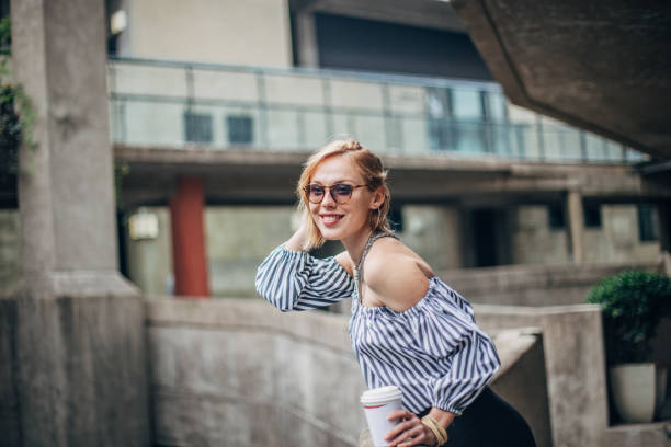 istock Woman with coffee 1196403483