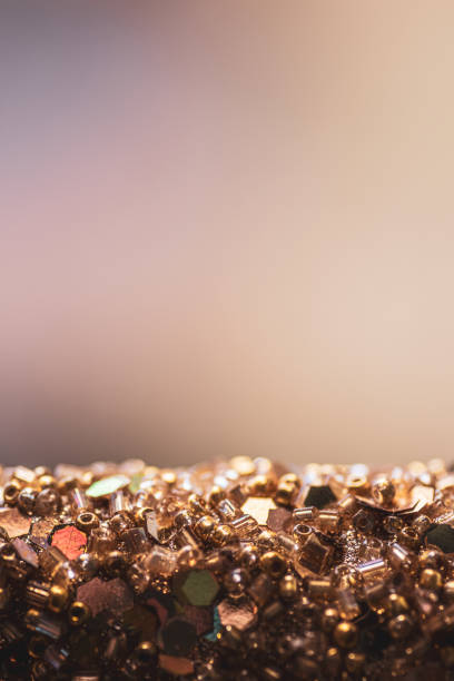 istock Light reflecting off a golden glittering decoration 1196412172