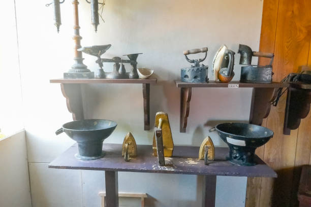 istock antique objects on wooden shelves 1196417600