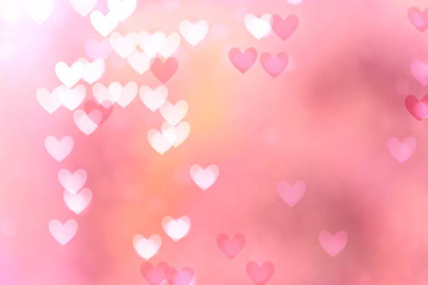 istock Abstract background with soft pastel colors and heart elements. Glowing backdrop, space for text 1196422044