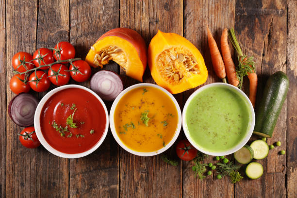 istock vegetable soup with ingredient on wood background 1196422910
