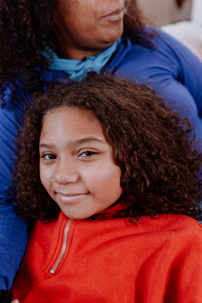 istock Young black girl looking at the camera 1196426898