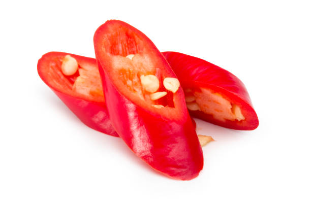 istock Sliced Fresh red pepper on a white background with clipping path. 1196427626
