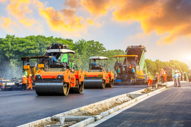 istock Construction site is laying new asphalt road pavement 1196433728