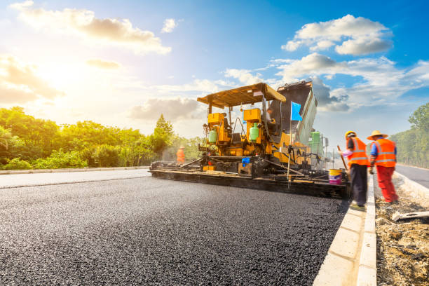istock Construction site is laying new asphalt road pavement 1196434200