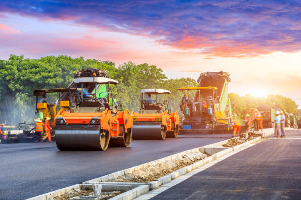 istock Construction site is laying new asphalt road pavement 1196434788