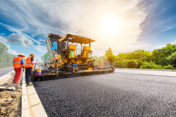 istock Construction site is laying new asphalt road pavement 1196434908