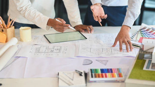 istock Close-up Interior designer working they colour wheel and digital tablet on architecture office. 1196442282
