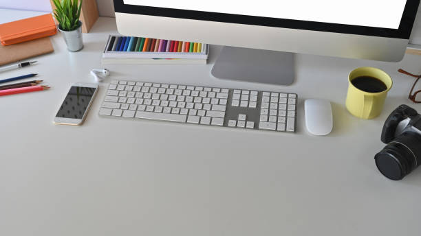 istock creative workspace, coffee cup and equipment on the working desk. 1196442910