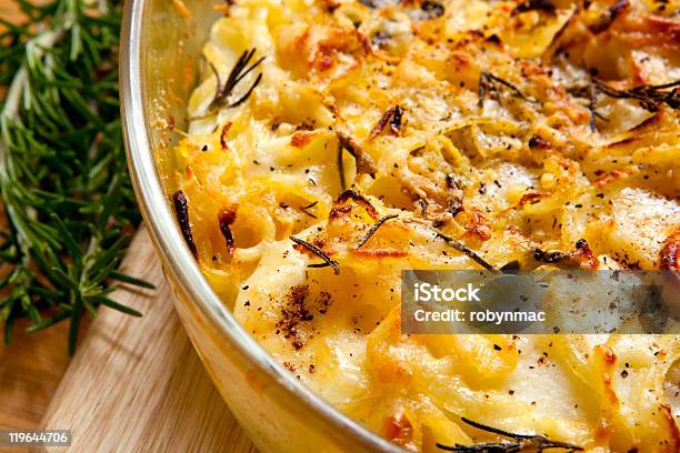 Potato Gratin With Rosemary Stock Photo - Download Image Now - Baked, Bowl, Casserole