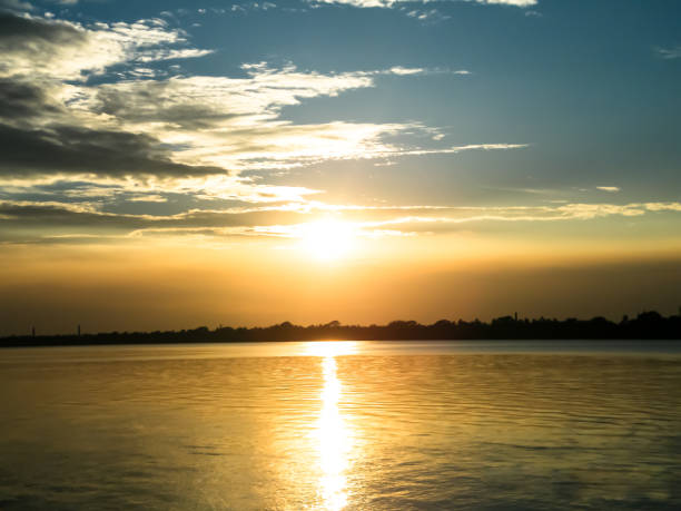 istock Dramatic Sunset sky fluffy overcast environment. Mix of glowing vibrant colors pattern textured effect (dark, yellow, red, blue, purple, pink, white) Peace spirituality beauty ethereal idyllic climate 1196449915