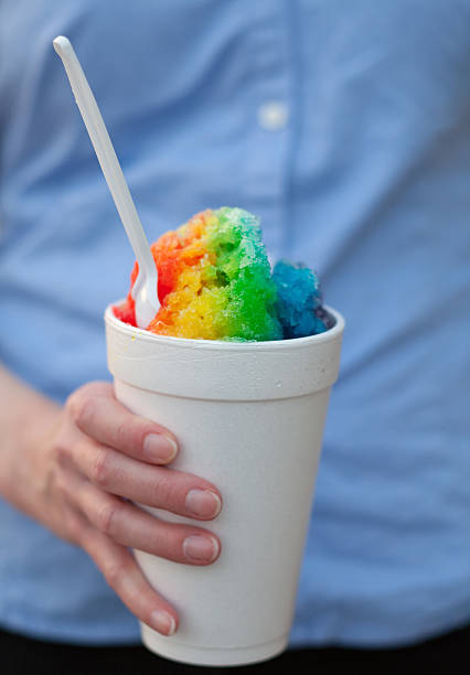 istock Woman holding colorful snow cone 119645286