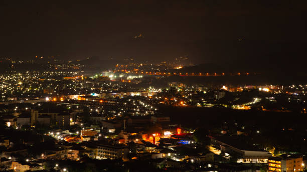 istock Blurred nihgt light in Phuket Thailand.Landscape background. 1196456521