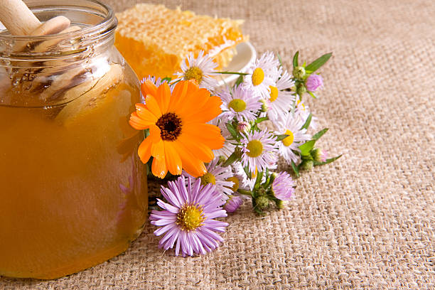 istock honeycomb, flowers and honey in pot 119645939