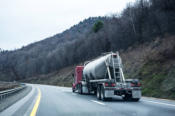istock Semi Trailer Truck Liquid Cargo Tanker Speeding on Expressway 1196460207