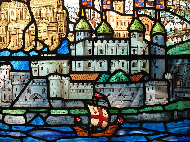 Image of a Tudor galleon sailing past the Tower of London on a stained glass window at the early medieval church of All Hallows by the Tower, London England