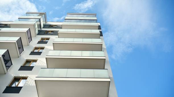 istock Multistory new modern apartment building. 1196466946
