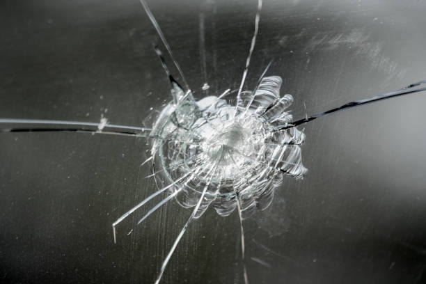 istock Car window glass pane hit and cracked by a flying stone 1196470311