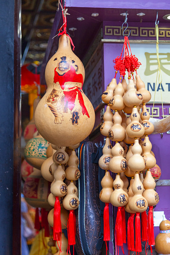 Traditional Chinese bottle gourd (Chinese Good Luck Wu Lou) on sale at a shophouse in YuYuan Market in Shanghai.
