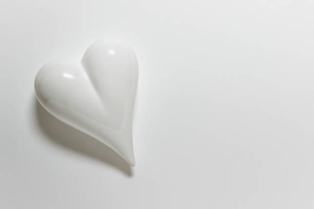 istock White porcelein heart on white backgound 1196476960