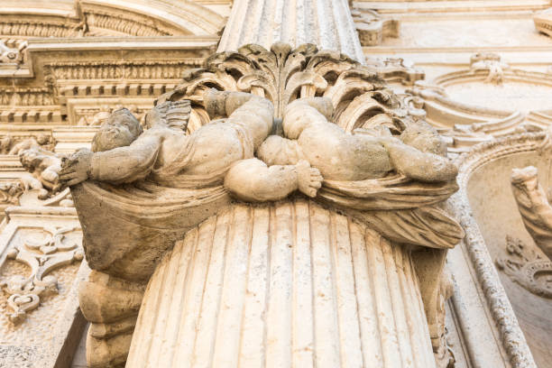 Detail of the decorated column on St. Mark Cathedral facade. Venice. Italy.