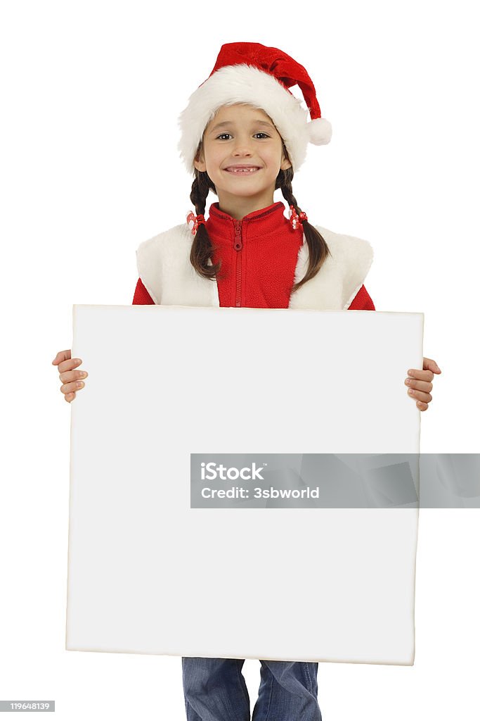 Dziewczynka w Boże Narodzenie kapelusz z pustym baner - Zbiór zdjęć royalty-free (Dziewczyny)