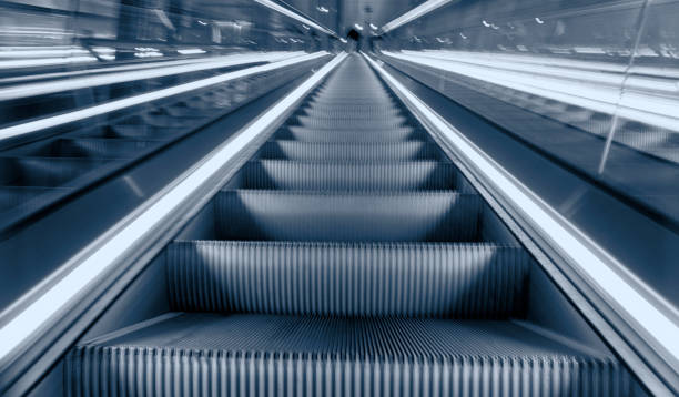 istock Modern station escalator with long exposure 1196481629